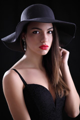 Attractive young woman in hat