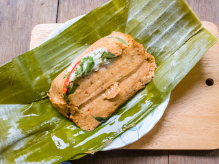 Steamed fish curry in banana leaves