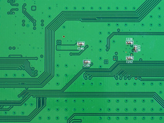 Close up of a printed green computer circuit board