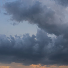 Fototapeta na wymiar rain cloud on sunset sky background
