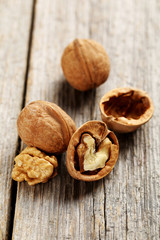Walnuts on a grey wooden table