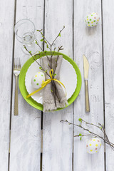 Spring Easter Table setting at wooden table. Top view.