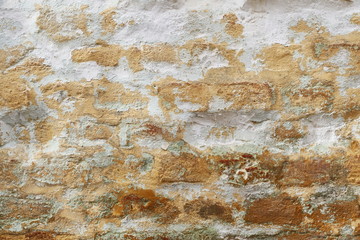 old vintage brick wall texture  with white stucco background