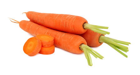 Stack of ripe carrots with cutted tops on white background