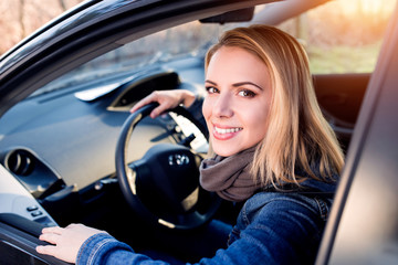 Fototapeta na wymiar Woman driving a car