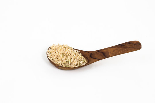 Rice on wooden spoon