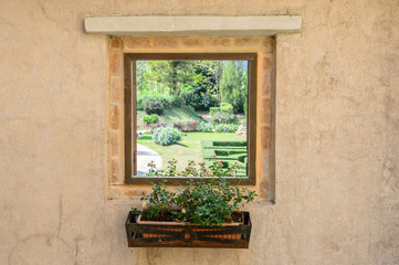 Fototapeta na wymiar Italian Window with Open Wooden Shutters