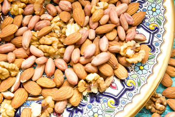 different nuts on a blue background