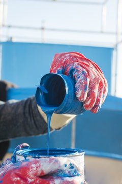 workers preparing paint