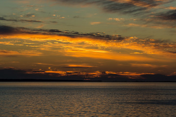 Beautiful summer sunset in the river. Evening HDR image