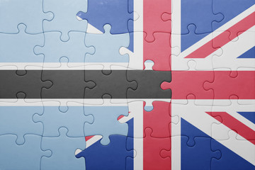 puzzle with the national flag of great britain and botswana