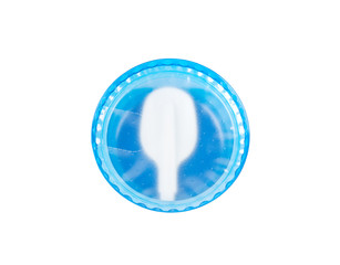 disposable plastic spoon in yogurt cap