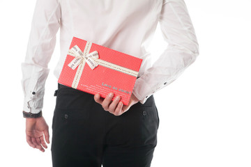 man with a gift behind his back
