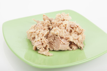 tuna on a plate on white background