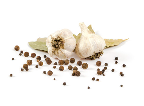 pepper is a spice, garlic and laurel leaf isolated