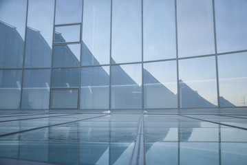 Glass roof reflections in blue