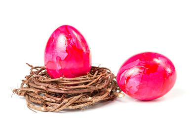 Two Easter eggs in the nest, isolate on a white background