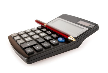  red pen lies on a black calculator