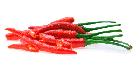 water drop that red chili peppers white background