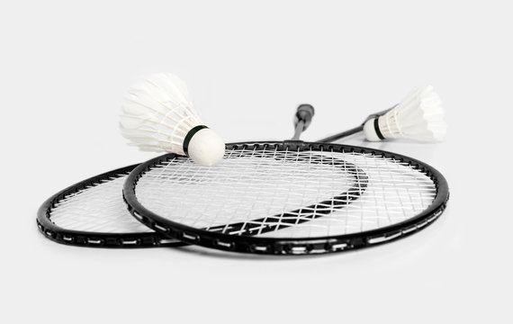 rackets for badminton and shuttlecock two monochrome