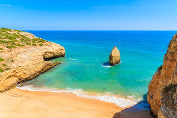 A view of beautiful sandy beach from high vantage point near Carvoeiro town, Portugal
