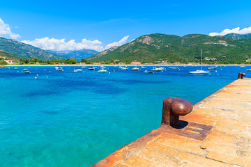 Fototapeta premium Turquoise sea and mountains on coast of southern Corsica island near Cargese town, France
