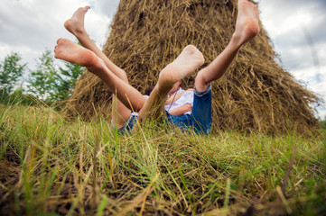 Couple jumped in a haystack