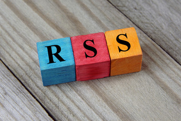 RSS text (Rich Site Summary) on colorful wooden cubes