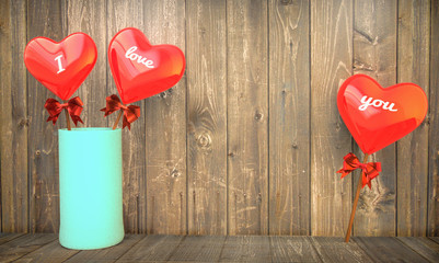 three hearts with text i love you with wooden background