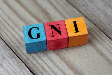 GNI (Gross National Income) sign on colorful wooden cubes
