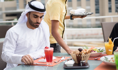 Handsome Arab Emirati Man Is Dining Outdoor