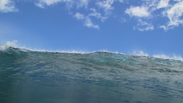 Empty Blue Ocean Wave Crashing In Slow Motion