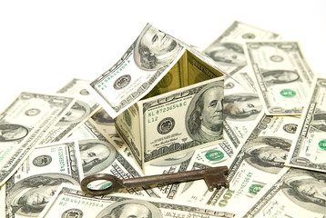 US dollar banknotes on display in the shape of a house on over w
