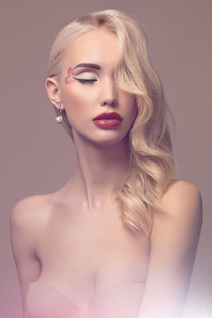 beautiful blond young woman with make-up