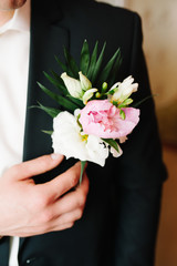 Pinning a Boutonniere