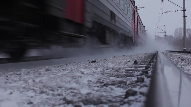 Moving passenger train in winter