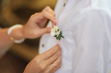 Pinning a Boutonniere