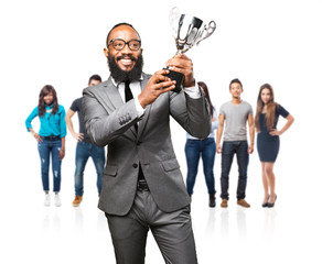 business black man holding a trophy