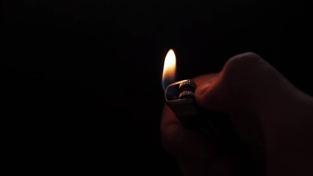 Using a Lighter at Night with Sparkles