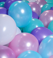 turquoise background with balloons