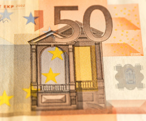 Paper money from 50 euro on white background