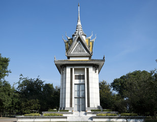 A commemorative stupa filled with the skulls of the victims at the Killing Field of Choeung Ek.