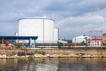 White oil tanks on Black sea coast in Varna port