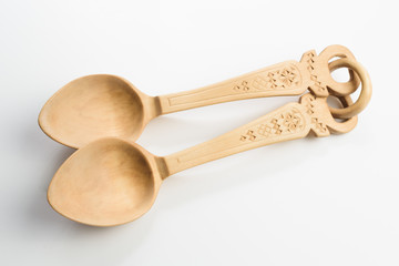 Wooden spoon on white background