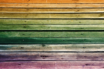 old dirty wood board arrange as a background, colorful