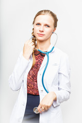 Smiling medical doctor woman with stethoscope