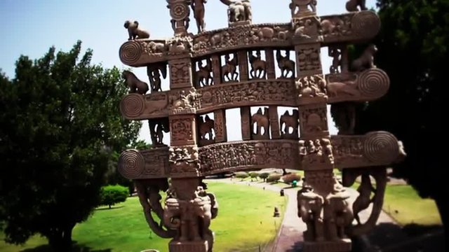 Fade in shot of carved decoration of the Northern torana to the Stupa of Sanchi, Raisen District, Madhya Pradesh, India