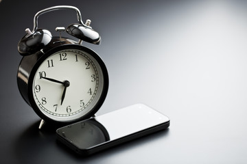 alarm clock with cellphone