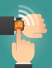Hand pointing a smart watch with a hanger
