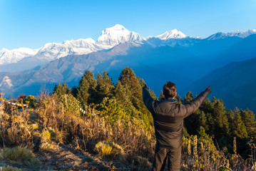 Fototapeta premium Hiker enjoying the views of the Himalayan mountains